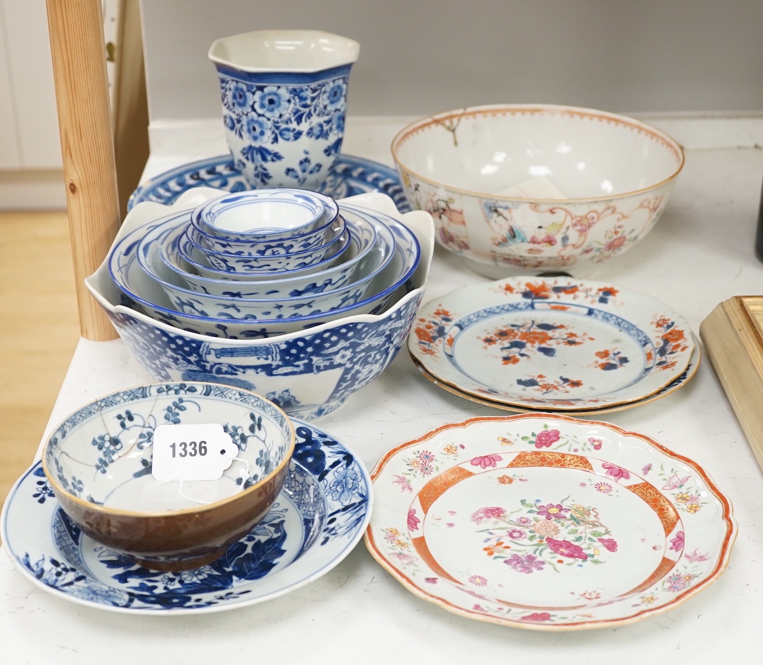 An assortment of Chinese porcelain tin-glazed earthenware charger and a Delft vase